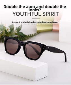 Close-up of black TR material polarized sunglasses featuring a retro oversized frame