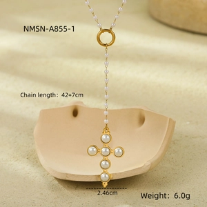 Detailed specs of the gold cross necklace with pearl inlays and chain length info