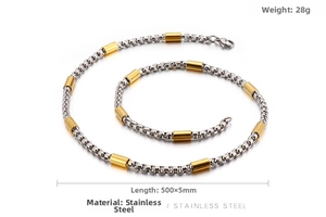 Detail of silver box chain necklace with gold accents and 5mm width stainless steel links