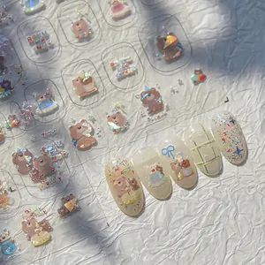 Holographic nail art stickers featuring cute cartoon bears and bows for DIY manicure