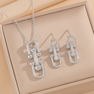 Silver 18K gold plated jewelry set with horseshoe links and cubic zirconia stones