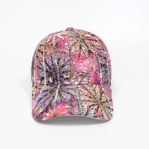 Close-up of floral baseball cap with vertical rhinestone lines and silver metal stars