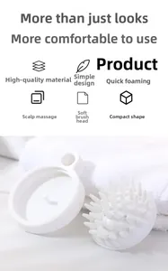 Macro shot of white silicone scalp massager brush with soft bristles and hanging hole design