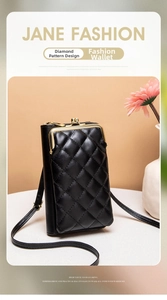 Close-up of black quilted mobile phone bag with golden vintage metal frame clasp