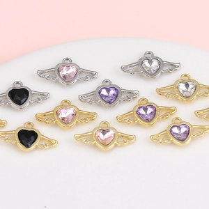 Winged heart charms in gold and silver finish with multicolored faux gemstone inlays