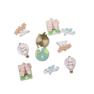 Travel themed enamel alloy pendants featuring hot air balloon and Eiffel Tower motifs