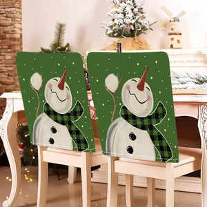 Set of 2 festive green snowman Christmas chair covers for holiday dining room decor