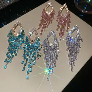 Sparkling crystal tassel earrings with marquise frames in pink, blue, and silver finishes