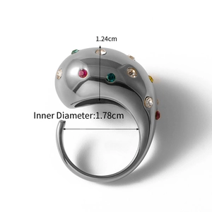 Detail view of silver drop-shaped ring with colorful rhinestones and size measurements
