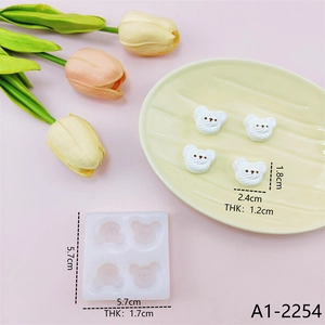 Detail view of 4-cavity bear silicone mold with specific dimensions for resin craft