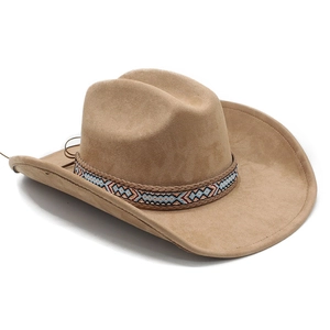 Close-up of suede western cowboy hat with ethnic woven pattern band and tassel details