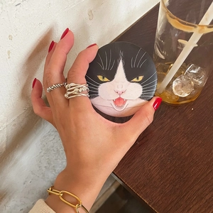 Irregular 925 sterling silver wrap ring on hand with a cute black and white cat accessory