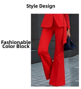 Detail of red slim-fit blazer and matching flared trousers for a stylish business look