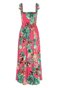 Detail of smocked chest and tropical floral print on a tiered summer maxi dress