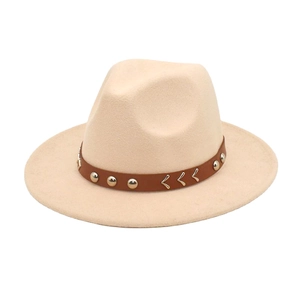 Close-up of beige wool fedora hat with brown leather band and gold metal rivet detail