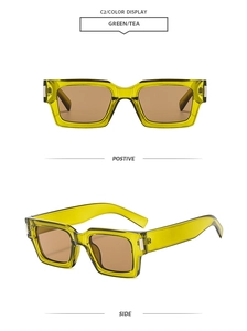 Detail view of square thick frame sunglasses in green tea resin with brown lenses