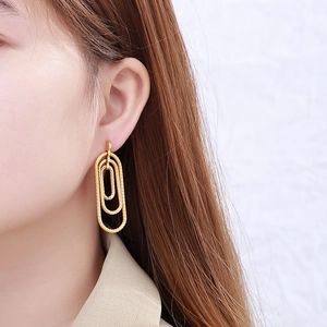Gold spiral textured triple oval drop earrings for women with elegant geometric design