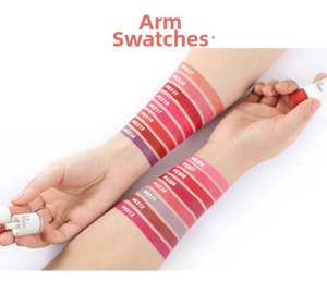Arm swatches of 16 velvet matte lip glaze shades ranging from berry to nude colors