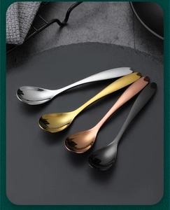 Polished 304 stainless steel spoons in silver gold rose gold and black displayed on stone