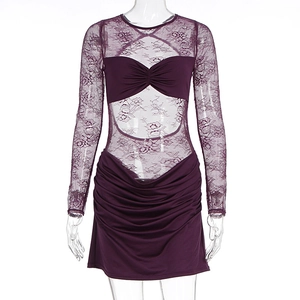 Detail of deep purple lace stitching and ruched fabric on a sexy long sleeve dress