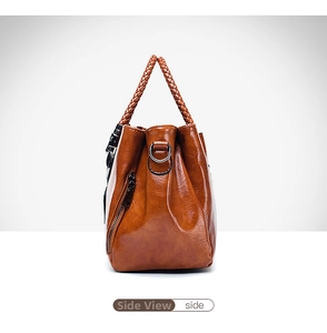 Side view of brown retro oil wax leather boston handbag featuring woven handles