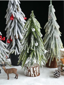Mini desktop Christmas tree with fake snow, silver ornaments and natural wood base