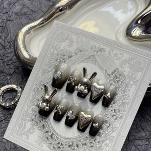 Gothic dark queen press-on nails with 3D silver bunny and heart charms on ombre grey base