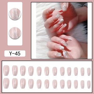 Pink glitter press-on nails with white stars featuring model display and 24pc set layout