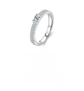 Macro detail of S925 sterling silver ring featuring double row paved diamonds and oval stone