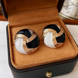 Vintage round button stud earrings with black and white enamel and gold screw texture