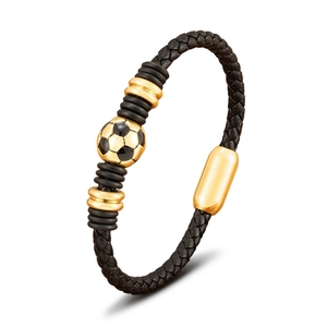 Detailed view of leather football bracelet featuring a gold magnetic clasp and woven strap