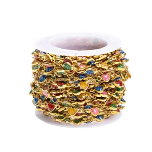 Golden stainless steel DIY chain with colorful heart-shaped enamel charms on a spool