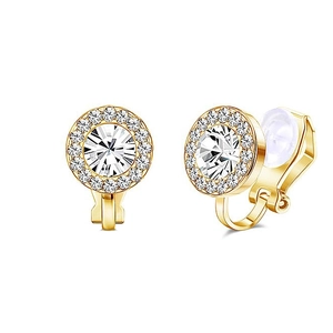 Macro detail of gold clip-on earrings featuring a large halo-set round crystal gem