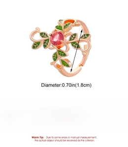 Detailed specs of rose gold floral ring with green enamel leaves and pink gemstone