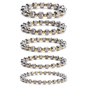 Five gold and silver beaded elastic bracelets in various sizes on a white background