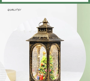 Macro view of a bronze Christmas lantern with LED snow scene and festive tree decor
