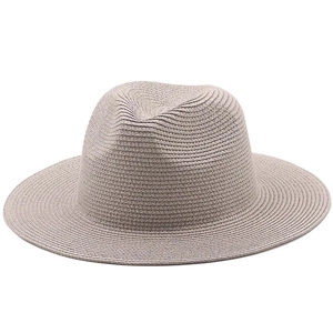 Flat-top straw sun hat in oatmeal beige with wide brim for summer beach vacation