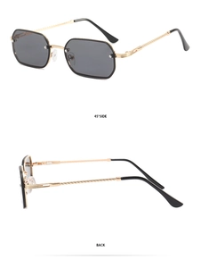 Detail showing the 45-degree side view and back of rimless golden metal sunglasses