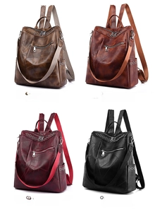Collezione di quattro zaini in pelle vintage in marrone, caffè, bordeaux e nero