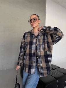 Women's plaid long sleeve shirt jacket in brown and navy blue check pattern