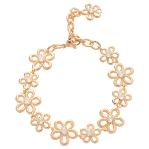 Golden flower bracelet with sparkling zircons and textured petals on a white background