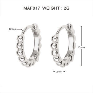 Detail view of 13mm beaded brass hoop earrings with dimension and weight markers