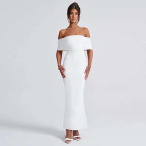Detailed view of white off-the-shoulder maxi dress with elegant ruched details and slim fit