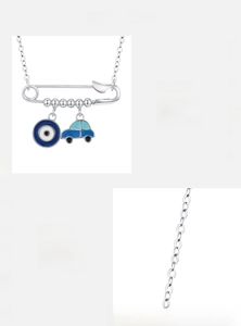 Detail of S925 sterling silver safety pin necklace with blue evil eye and zircon charm