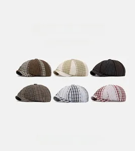 Showcase of six British style newsboy caps with plaid, striped, and houndstooth patterns