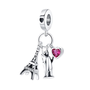 Silver landmark charm featuring Eiffel Tower, Statue of Liberty, and pink gemstone heart