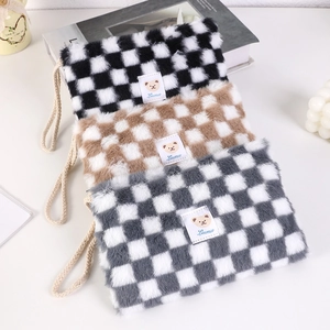 Three plush checkerboard bear cosmetic bags stacked, featuring cute fuzzy texture in ins style