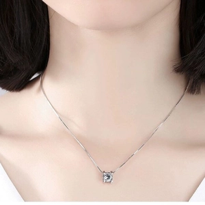 Minimalist 925 silver bull head necklace with square zircon pendant worn by model