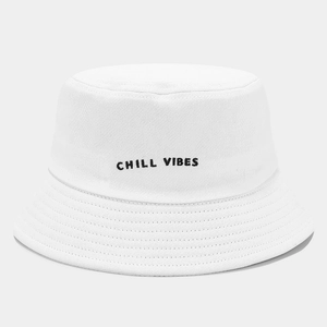 White cotton canvas bucket hat with black CHILL VIBES embroidery and reinforced stitching