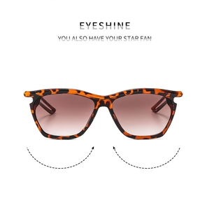 Detail of square children's sunglasses with leopard print frames and brown gradient lenses